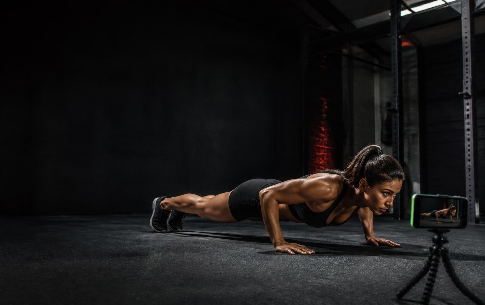 Athlete completing a camera-verified push-up